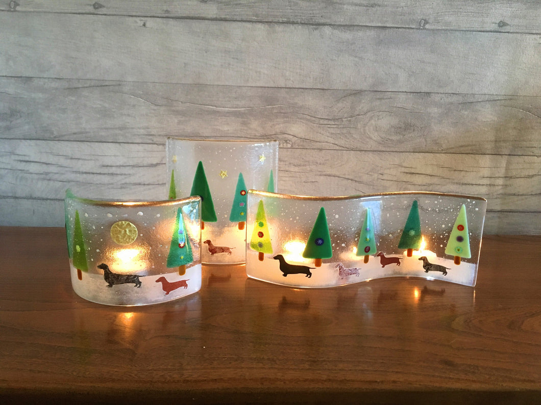 Set of 3 Fused Glass Christmas Tree Candle Screens featuring dachshunds walking in the snow.